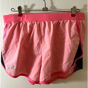 Under Armour pink athletic shorts, size medium